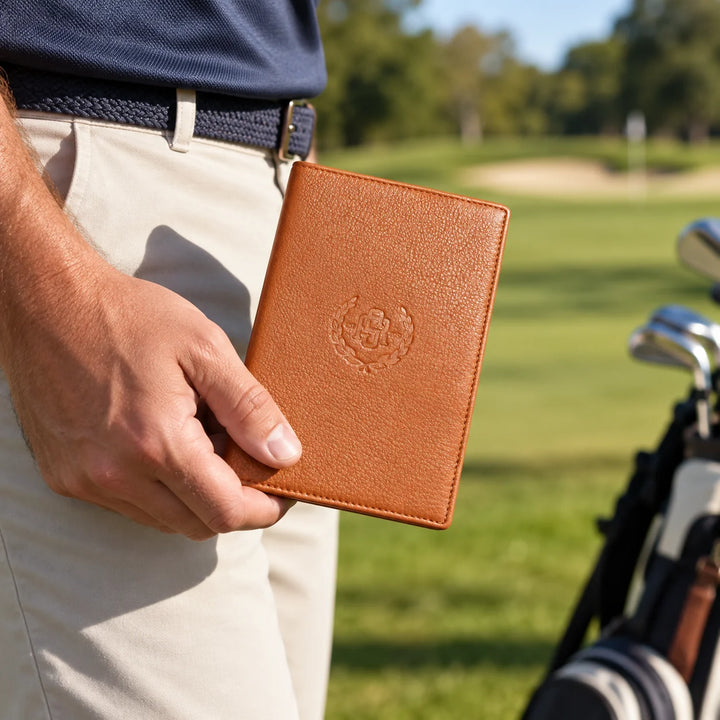 Cognac leather golf scorecard holder in a realistic golf setting