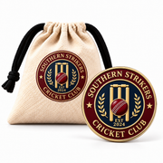 Southern Strikers Cricket Club round enamel pin and matching branded pouch on white background