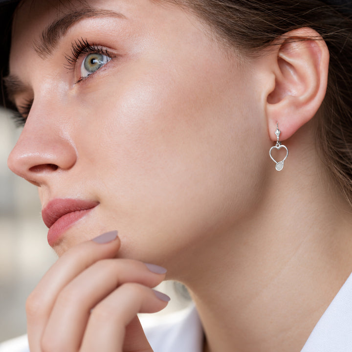 Tennis Heart Hanging Earrings worn in natural daylight