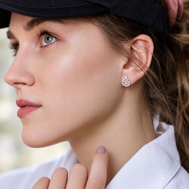 Tennis Minimal Ball Earrings worn in natural daylight