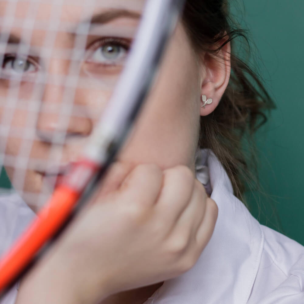 Ohrringe mit gekreuzten Tennisschlägern
