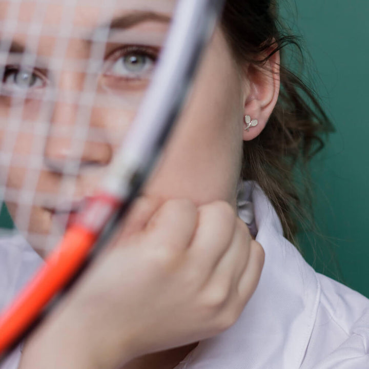 Ohrringe mit gekreuzten Tennisschlägern